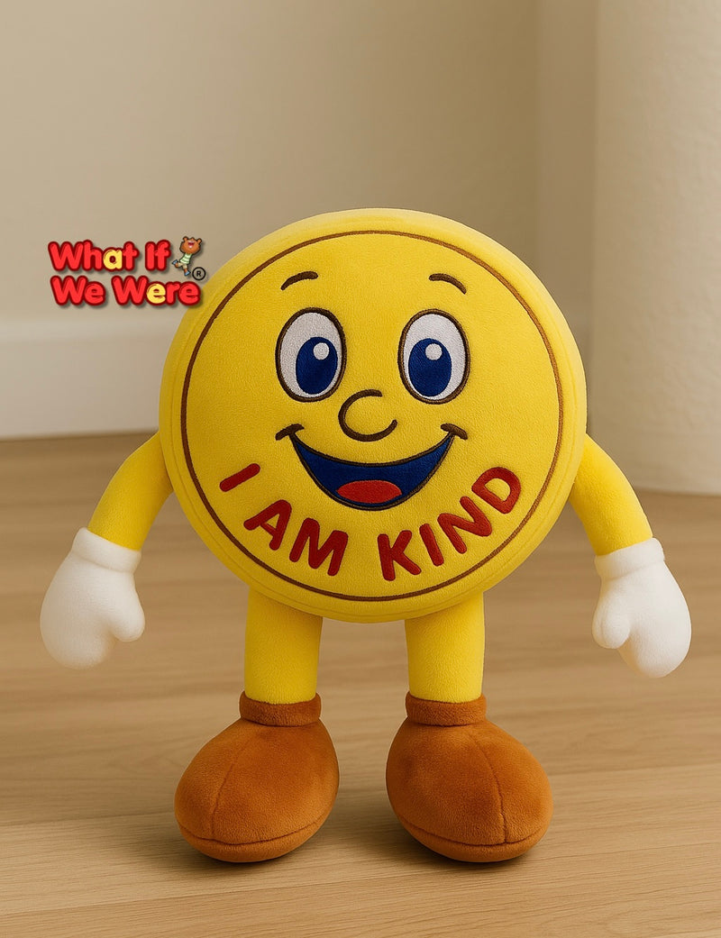 Plush toy with a smiley face and 'I AM KIND' text on a wooden floor.
